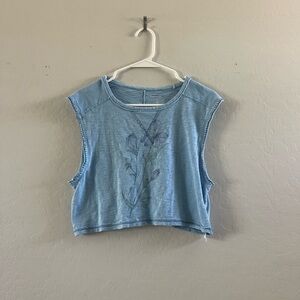 Blue Sleeveless Top with Floral Design